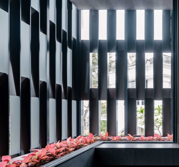 Aluminium lattice screen in 3ASH House ensures privacy and solar shading