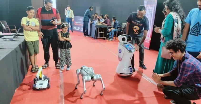 Robotic canines featuring aluminium amuse audiences at the Roboverse Expo