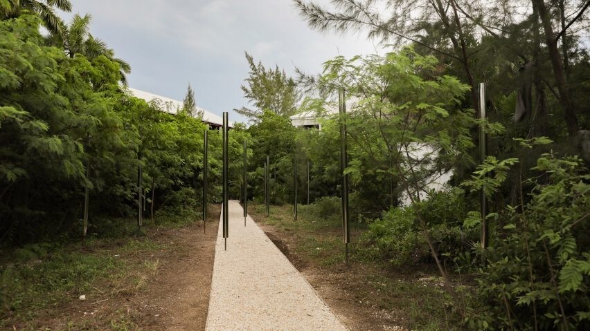 Ghanaian studio designs abandoned Duho Pavilion with reflective aluminium poles